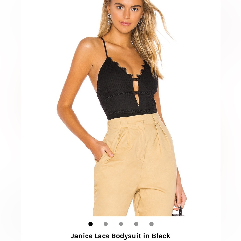 REVOLVE super down black bodysuit. Size small. Never worn..